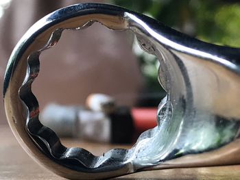 Close-up of old electric lamp on table