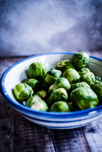 Close-up of brussels sprouts in bowl on table