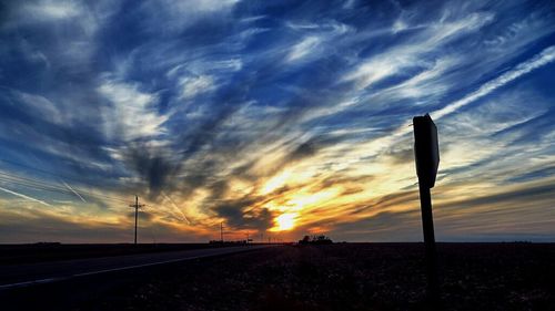 Scenic view of landscape at sunset