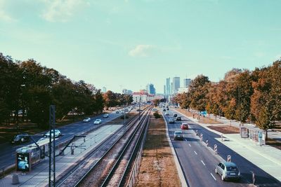 High angle view of railroad tracks in city against sky