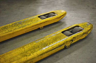 Closeup of yellow pallet trucks