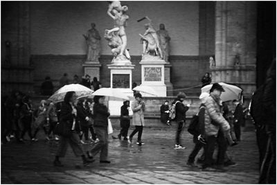 Group of people in front of building