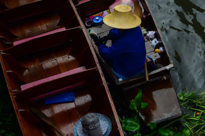 High angle view of worker working in water