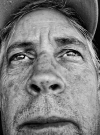 Close-up of mature man looking away