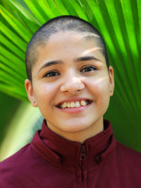 Close-up portrait of smiling boy