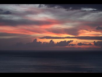 Scenic view of dramatic sky during sunset