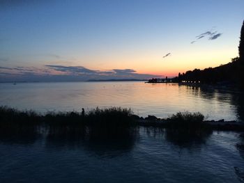 Scenic view of sea at sunset