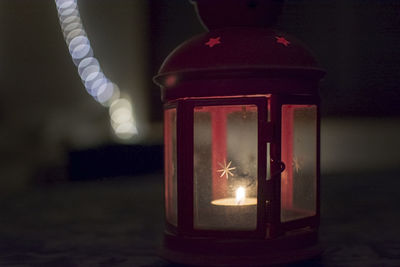 Close-up of illuminated lantern at night