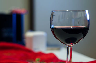 Close-up of wineglass on table