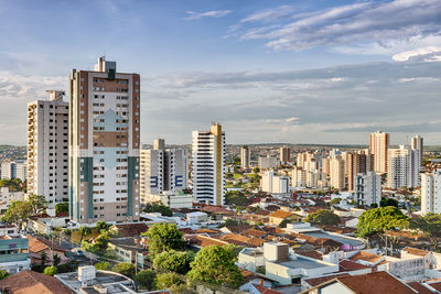 Modern buildings in city against sky