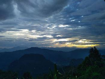 Scenic view of mountains against sky during sunset