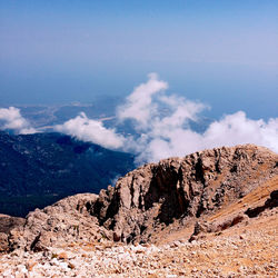 Rock formation on mountain against sky