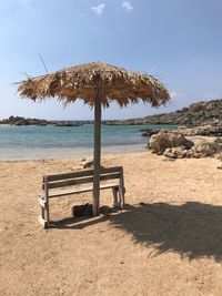 Scenic view of beach against sky