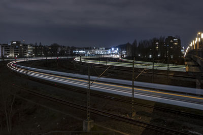 High angle view of light trails on road in city