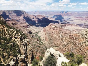 Aerial view of landscape against cloudy sky