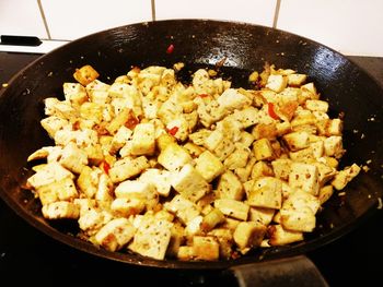 High angle view of meat in cooking pan