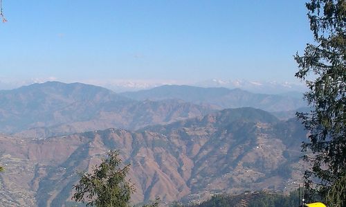 Scenic view of mountains against clear sky