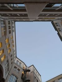 Low angle view of buildings against clear sky