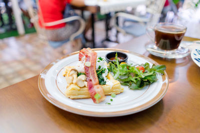 Close-up of food served on table