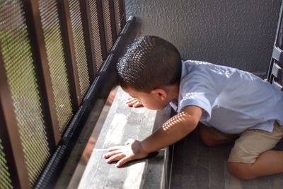 High angle view of boy at home