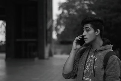 Portrait of young man looking away