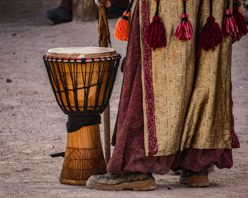 Low section of person with conga