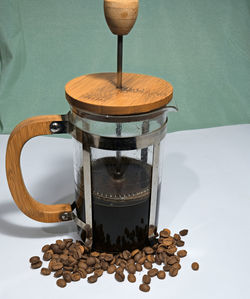 Close-up of coffee beans on table