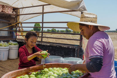 Farmers working at farm