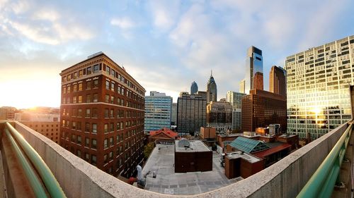 Panoramic view of buildings in city against sky