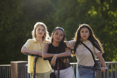 Portrait of confident young female friends