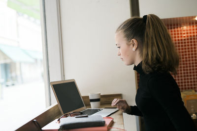 Woman working on laptop