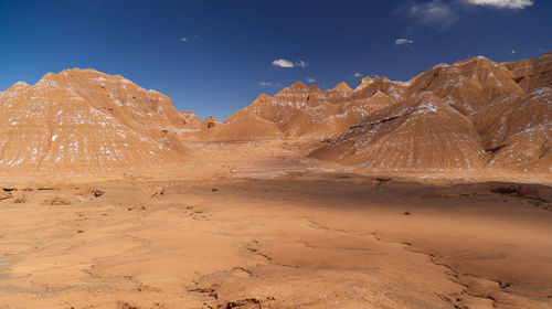 Scenic view of desert against sky