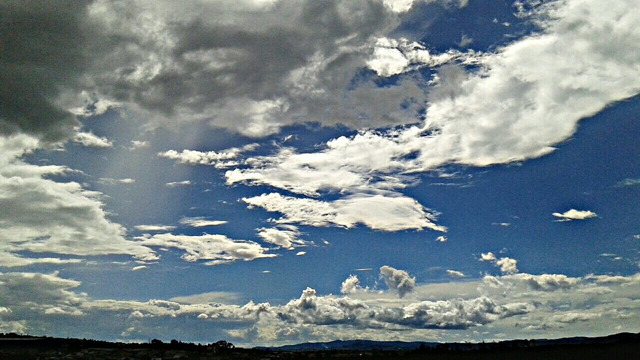 sky, cloud - sky, tranquil scene, scenics, tranquility, beauty in nature, nature, cloudy, weather, landscape, winter, snow, cloud, white color, cold temperature, day, idyllic, outdoors, blue, no people