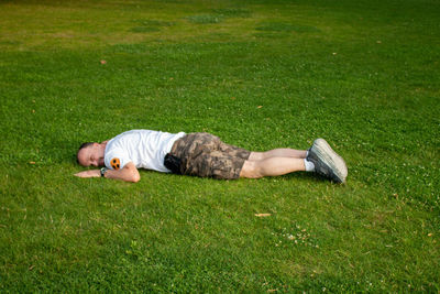 Man sleeping on grass