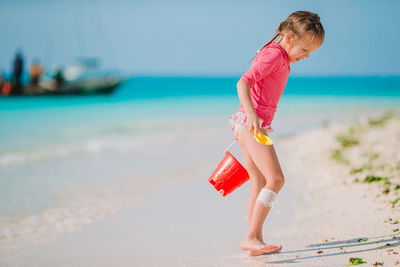 Full length of woman on beach