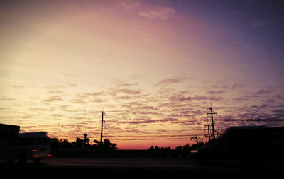 Silhouette of city at dusk