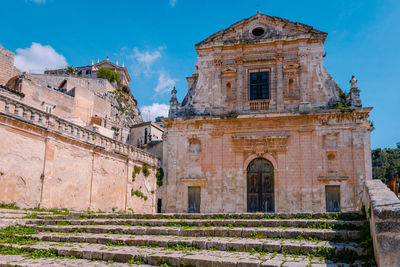 Low angle view of historic building against sky