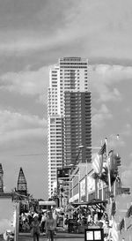 View of city against cloudy sky