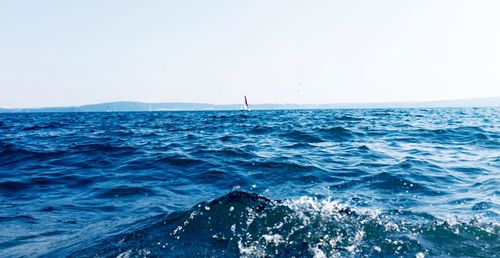 Scenic view of sea against clear sky