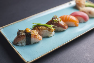 Close-up of sushi served in plate on table