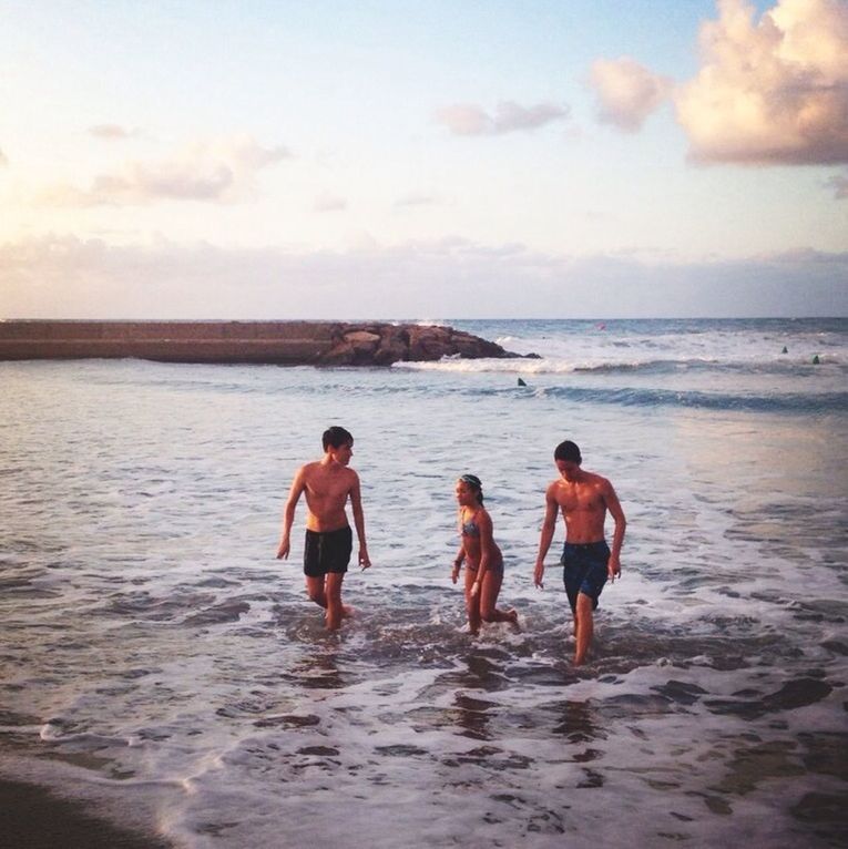 water, sea, beach, togetherness, lifestyles, leisure activity, horizon over water, bonding, sky, men, vacations, full length, shore, love, boys, rear view, person, walking