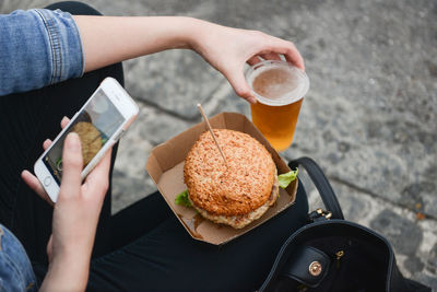 Woman photographing food