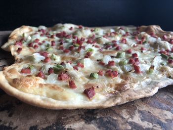 Close-up of pizza on cutting board