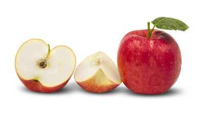 Close-up of apples against white background