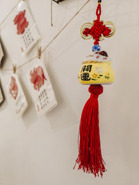 Close-up of christmas decorations hanging in shop