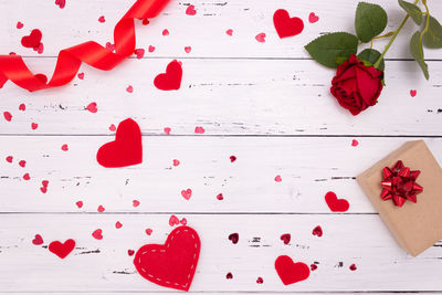 High angle view of red heart shape on table