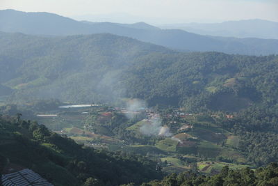 High angle view of agricultural field and mountains