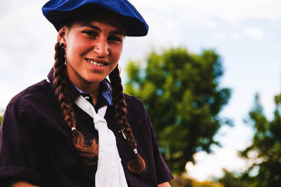 Portrait of smiling teenage girl wearing beret