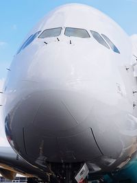 Low angle view of airplane against sky