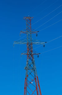 Low angle view of building against blue sky